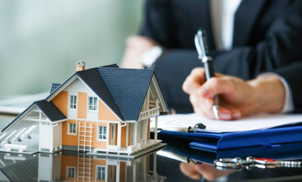 Home financing concept with house model